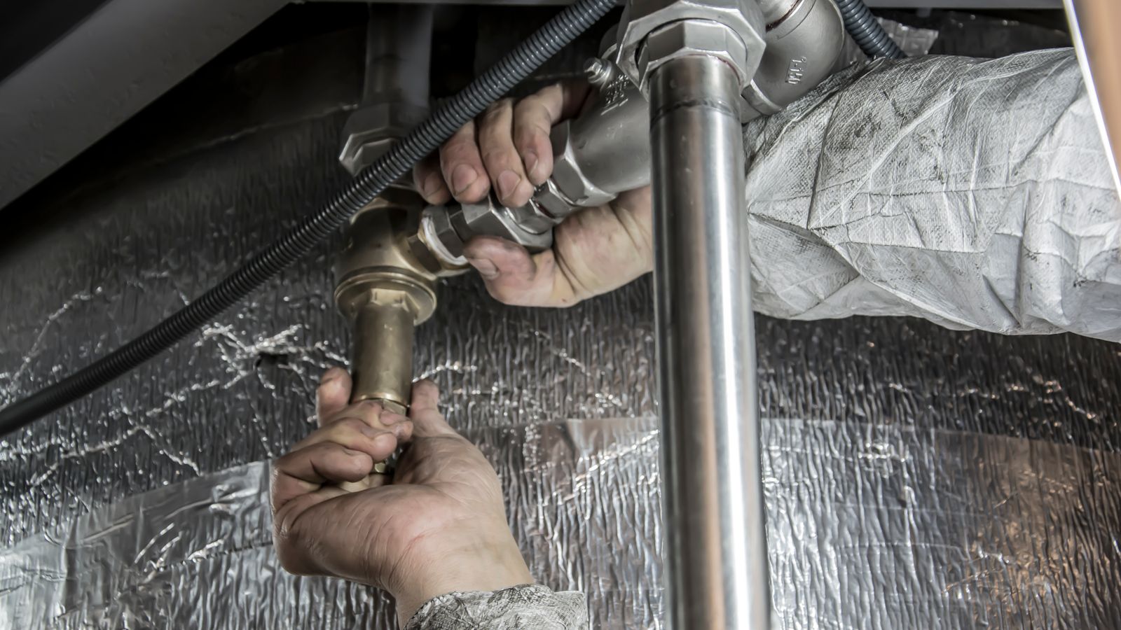 Plumber at work